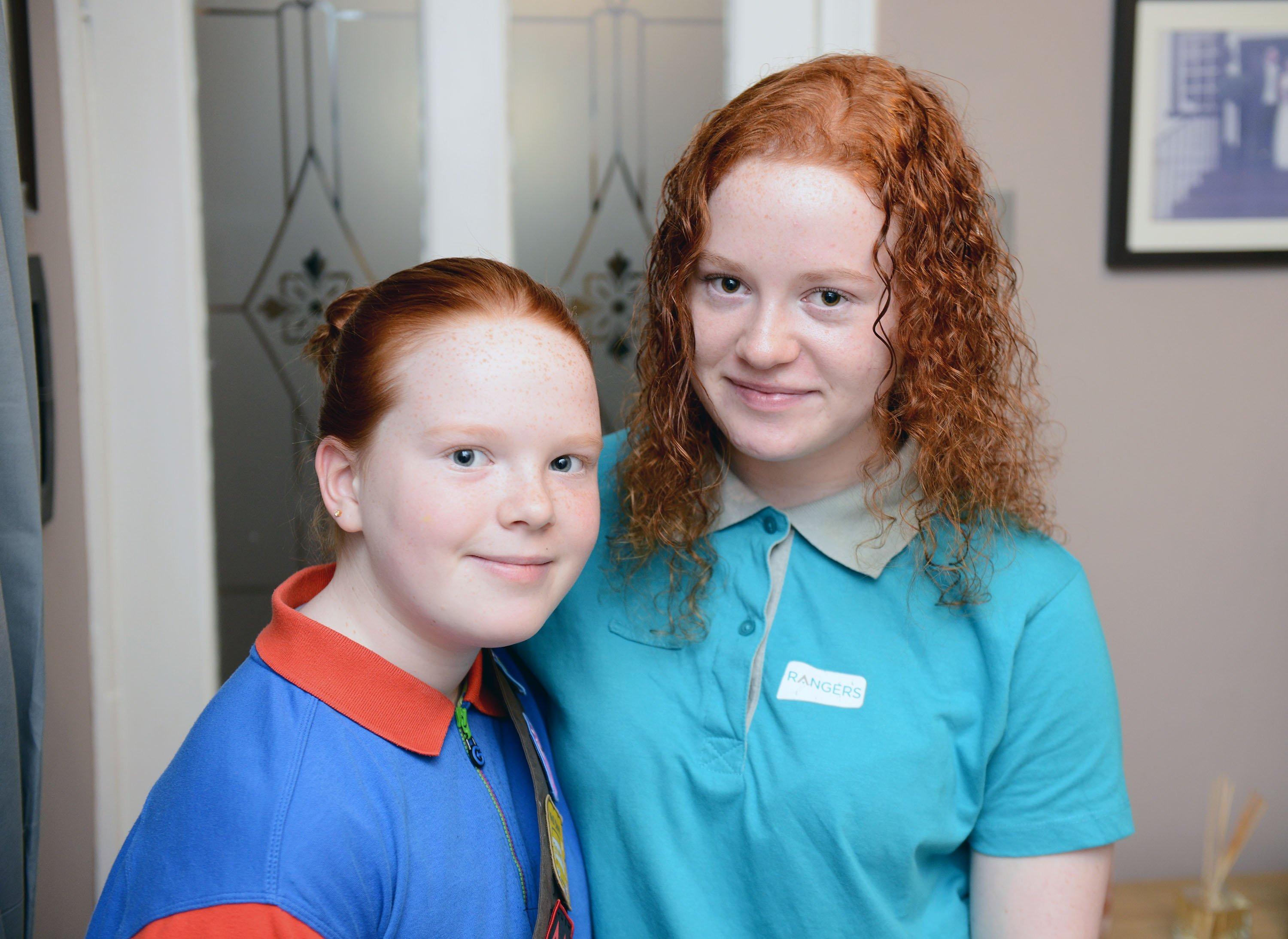 (Right) Sophie McLeod (15) with her sister Lucy (9). Picture by FRANK REID
