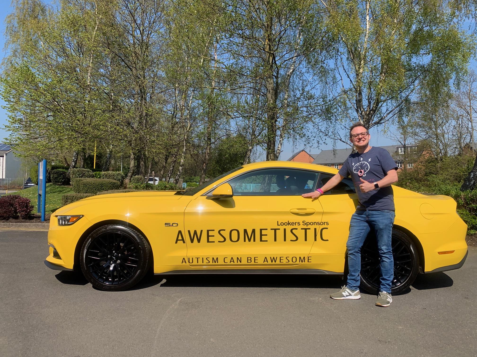 Richard Smith with his trademark Awesometistic yellow Ford Mustang.