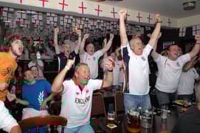 These fans look delighted with England's performance against Sweden. Recognise anyone? 