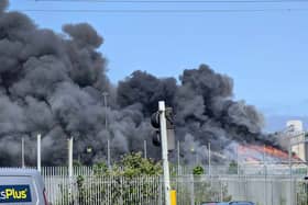 Footage captured at the scene shows what looks to be a warehouse engulfed in flames.