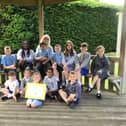 Headteacher Carol Devine with pupils at St Bede’s Catholic Primary School. The school has received an 'Outstanding' rating following an inspection by Ofsted.