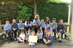Headteacher Carol Devine with pupils at St Bede’s Catholic Primary School. The school has received an 'Outstanding' rating following an inspection by Ofsted.
