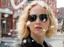 Jennifer Lawrence wearing gold-framed aviators in the movie Joy