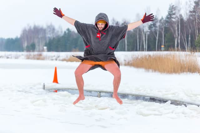<p>How a dry robe helps when wild swimming, best in the UK 2022</p>