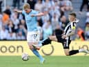 De Bruyne was furious with this challenge from Trippier. Credit: Getty.