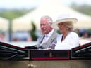 The Prince of Wales with The Duchess of Cornwall are seen in the royal procession during Day Two of Royal Ascot 2022
