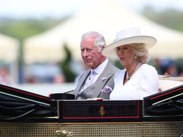 The Prince of Wales with The Duchess of Cornwall are seen in the royal procession during Day Two of Royal Ascot 2022