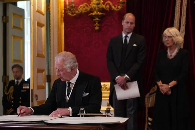 King Charles III sign an oath to uphold the security of the Church in Scotland during the Accession Council at St James’s Palace, London, where King Charles III is formally proclaimed monarch. Charles automatically became King on the death of his mother, but the Accession Council, attended by Privy Councillors, confirms his role. Picture date: Saturday September 10, 2022. (Photo: PA)