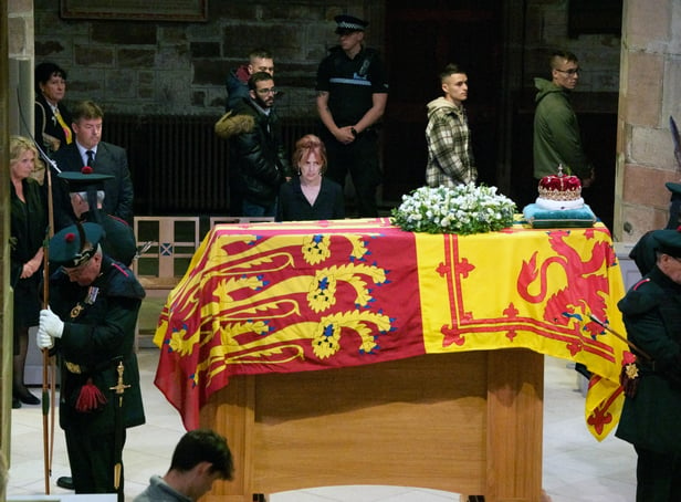 <p>Members of the public file past the coffin of Queen Elizabeth II in St Giles' Cathedral, Edinburgh, as it lies at rest. Picture date: Monday September 12, 2022.</p>
