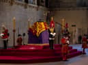 The Queen lying in state in Westminster Hall. 