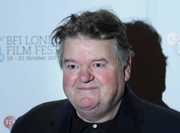<p>British actor Robbie Coltrane attends a photocall for the film Great Expectations in central London on October 21, 2012.  </p>