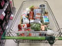 A shopping trolley is pictured at a Waitrose supermarket in London. 