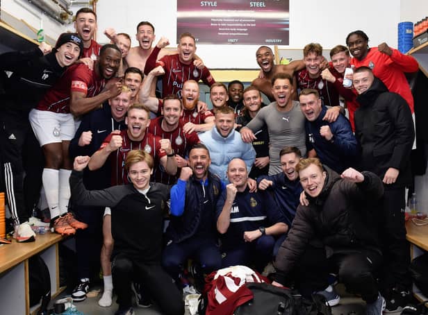 <p>South Shields players and staff celebrate after their FA Cup fourth qualifying round win against National League club Scunthorpe United (photo Kevin Wilson)</p>