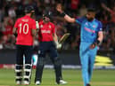 Alex Hales of England congratulates  Jos Buttler of England on his 50th run during the ICC Men's T20 World Cup Semi Final match between India and England at Adelaide Oval on November 10