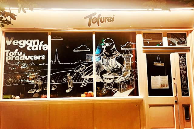 Pictured A self-proclaimed "pigeon-positive" vegan shop where the incident took place outside. Is there a pigeon murderer on the loose? A local community are on a manhunt after footage is shared of a man brutally crushing a pigeon with his scooter.
