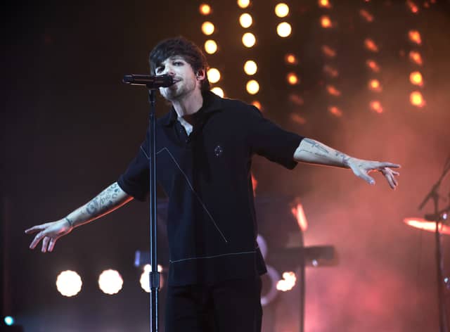 One Direction singer Louis Tomlinson reschedules in-store signing after breaking arm