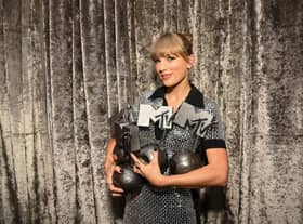 Taylor Swift is seen backstage with the Best Artist, Best Video, Best Pop and Best Longform Video Awards during the Best MTV Europe Music Awards 2022