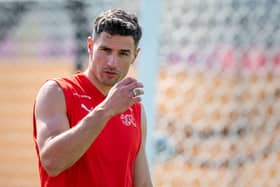 Fabian Schar attends a training session at the University of Doha for Science and Technology training facilities in Doha on November 16, 2022, ahead of the Qatar 2022 World Cup football tournament. (Photo by FABRICE COFFRINI / AFP) (Photo by FABRICE COFFRINI/AFP via Getty Images)