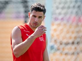 Fabian Schar attends a training session at the University of Doha for Science and Technology training facilities in Doha on November 16, 2022, ahead of the Qatar 2022 World Cup football tournament. (Photo by FABRICE COFFRINI / AFP) (Photo by FABRICE COFFRINI/AFP via Getty Images)