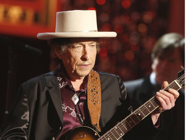 Bob Dylan has issued a rare public apology for selling books with automated signatures.  