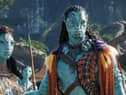 Ronal (Kate Winslet), Tonowari (Cliff Curtis), and the Metkayina Clan (Photo: © 2022 20th Century Studios)