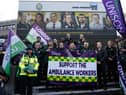 Christina McAnea, general secretary of UNISON, poses with ambulance workers at a picket line outside the Waterloo ambulance station in London on December 21, 2022. - Striking UK ambulance workers took to the picket lines, escalating a dispute with the government over its refusal to increase pay above inflation after recent walkouts by nurses. (Photo by Niklas HALLE’N / AFP) (Photo by NIKLAS HALLE’N/AFP via Getty Images)