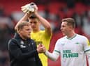 Newcastle United head coach Eddie Howe and left-back Matt Targett. (Photo by Stu Forster/Getty Images)