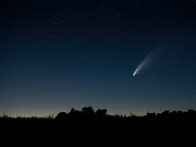 For the first time in 50,000 years, a green comet is expected to pass by Earth’s outer space that might just be bright enough to be seen by the naked eye.