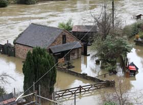 Houses in Ironbridge surrounded by flood waters as River Severn levels started to rise following heavy rain.