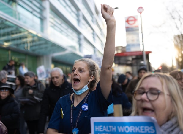 <p>Nurses and supporters gather outside University College Hospital before marching to Downing Street after a day of strike action on December 20 2022 in London. (Photo by Dan Kitwood/Getty Images)</p>