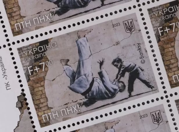 <p>Ukraine postage stamps depicting a Banksy mural</p>