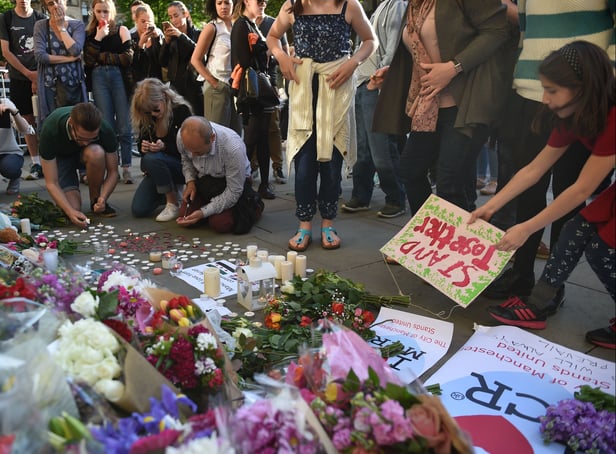 <p>A vigil held in Manchester city centre following the bombing at Manchester Arena. Photo: AFP via Getty Images</p>