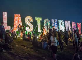Festival-goers enjoy the atmosphere prior to the 2013 Glastonbury Festival at Worthy Farm. (Photo by Ian Gavan/Getty Images)