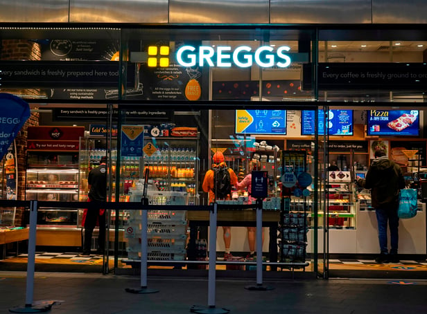 <p>People purchase food in a branch of the bakery chain Greggs inside London Bridge station.</p>