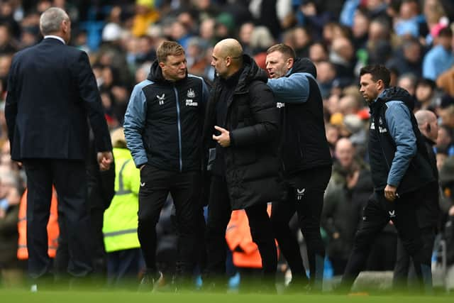 Newcastle United head coach Eddie Howe (left) & Manchester City boss Pep Guardiola. (Photo by Michael Regan/Getty Images)