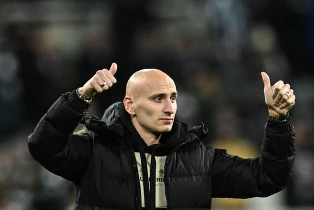 English midfielder Jonjo Shelvey salutes Newcastle United's fans as he prepares to leave the club for Nottingham Forest, during the English League Cup semi final football match between Newcastle United and Southampton at St James's Park stadium in Newcastle, on January 31, 2023. (Photo by Paul ELLIS / AFP) / RESTRICTED TO EDITORIAL USE. No use with unauthorized audio, video, data, fixture lists, club/league logos or 'live' services. Online in-match use limited to 120 images. An additional 40 images may be used in extra time. No video emulation. Social media in-match use limited to 120 images. An additional 40 images may be used in extra time. No use in betting publications, games or single club/league/player publications. /  (Photo by PAUL ELLIS/AFP via Getty Images)