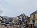 The person previously reported as missing after a suspected gas explosion in Swansea has been found dead.