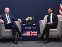 US President Joe Biden and British Prime Minister Rishi Sunak participate in a bilateral meeting during the AUKUS summit on March 13, 2023 in San Diego, California. President Biden hosts British Prime Minister Rishi Sunak and Australian Prime Minister Anthony Albanese in San Diego for an AUKUS meeting to discuss the procurement of nuclear-powered submarines under a pact between the three nations. (Photo by Leon Neal/Getty Images)