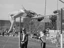 Dick Fosbury of the USA clears the bar in the high jump event at the AAAU Championships, Oregon, USA - Credit: Getty Images