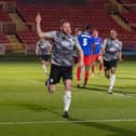 Louis Storey celebrates after scoring Gateshead’s first goal in their 3-0 home win against Dagenham & Redbridge (photo Charles Waugh)