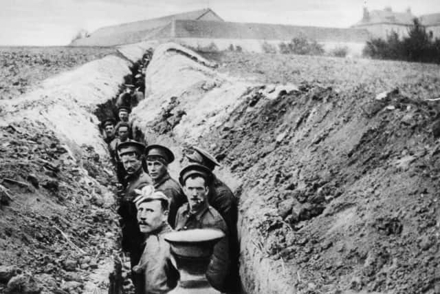 28th October 1914: British soldiers lined up in a narrow trench during World War I. (Photo by Hulton Archive/Getty Images)