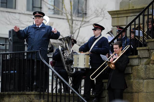 Members of the Salvation Army played their instruments in the market square. 