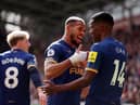 Alexander Isak of Newcastle United celebrates with teammate Joelinton after scoring the team’s second goal during the Premier League match between Brentford FC and Newcastle United at Brentford Community Stadium on April 08, 2023.
