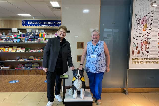 Sheila Graber (left) and Jackie Mountain with the statue of Tip.