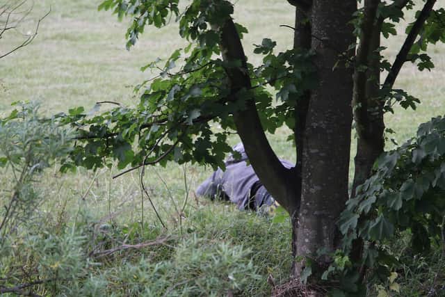 ULY 09:  A man fitting the description of fugitive gunman Raoul Moat is seen as Police negotiate with him on July 9, 2010 in Rothbury, England.  