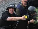 JULY 09:  Police negotiate with a man fitting the description of fugitive gunman Raoul Moat on July 9, 2010 in Rothbury, England.