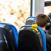 Image shows customer on-board a Northern train