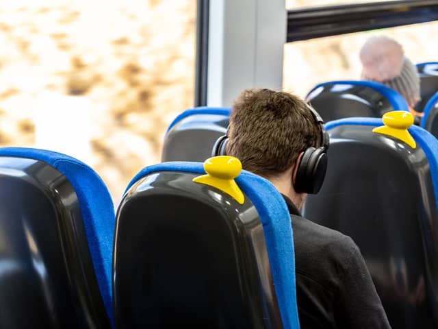 Image shows customer on-board a Northern train