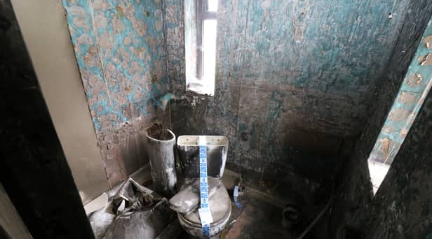 A house of horrors where potential buyers are banned from viewing it in person and the loo is taped off with ‘do not use’ labels is set to go under the hammer.