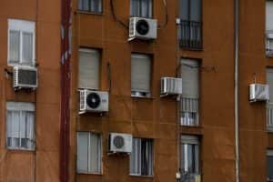 MADRID, SPAIN - JULY 14: Air conditioning units are seen on the exterior of apartment buildings as temperatures continue to soar on July 14, 2022 in Madrid, Spain. Europe is currently experiencing the most sustained period of extreme hot weather in 50 years. (Photo by Pablo Blazquez Dominguez/Getty Images)